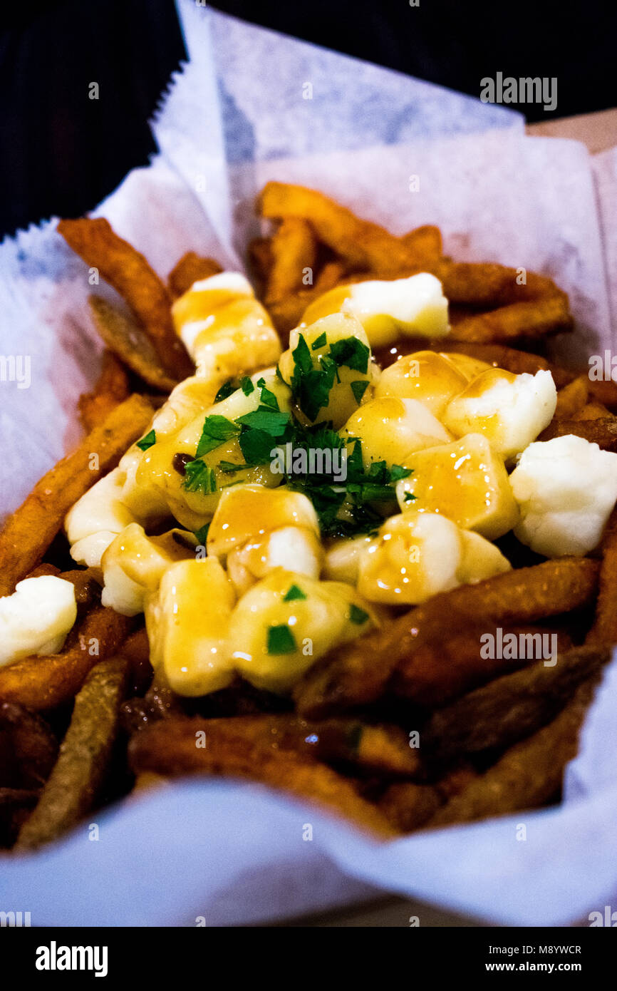 Poutine, classic Canadian food, gravy, cheese curd and chips Stock Photo Alamy