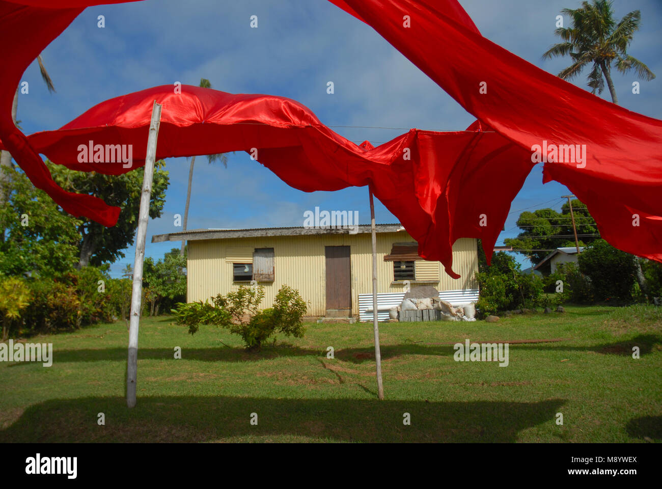 Red sheets drying on a washing line, Rakiraki, Fiji Stock Photo Alamy