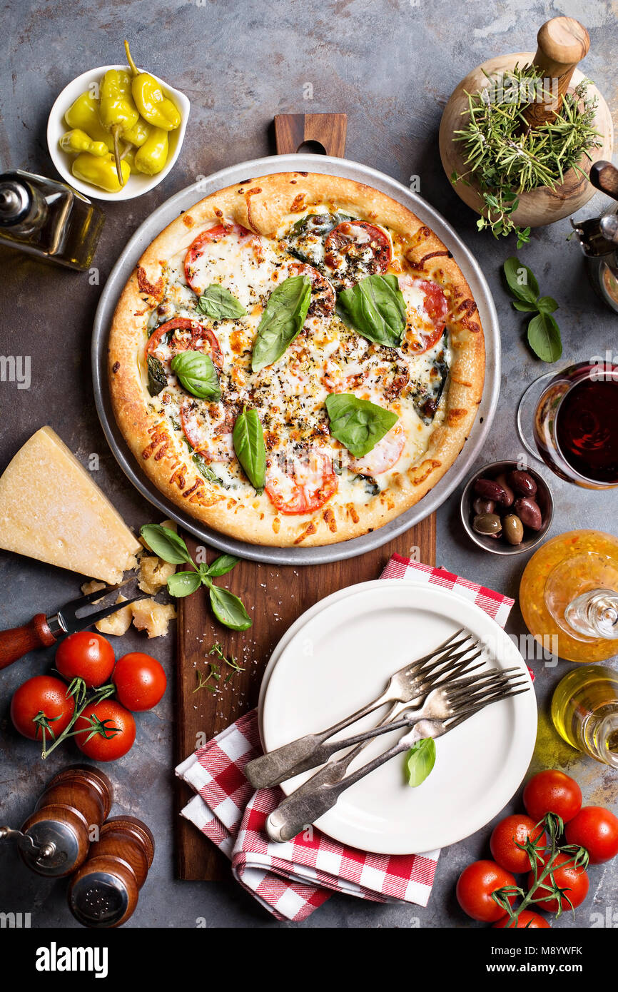 Margherita pizza with basil Stock Photo Alamy