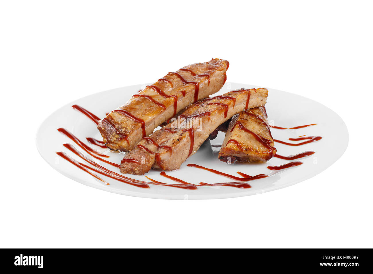 Ribs meat grill, barbecue, beef, lamb, barbecue sauce, tomato, spicy on a plate isolated white background. For the menu of the restaurant, bar, cafe.  Stock Photo
