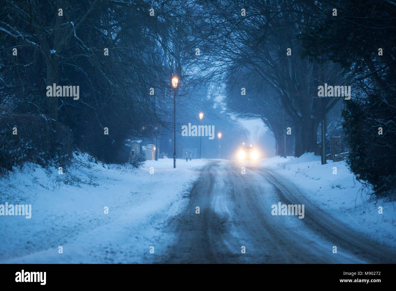 Snow covered road at dusk, Chipping Campden, The Cotswolds, Gloucestershire, England, United Kingdom, Europe Stock Photo