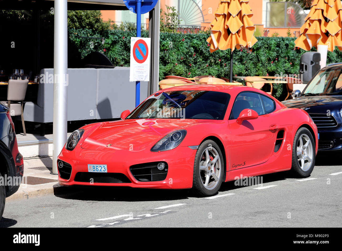 Menton, France - March 19, 2018: Luxury Red Porsche 718 Cayman S Parked In The Street Of Menton On The French Riviera Stock Photo