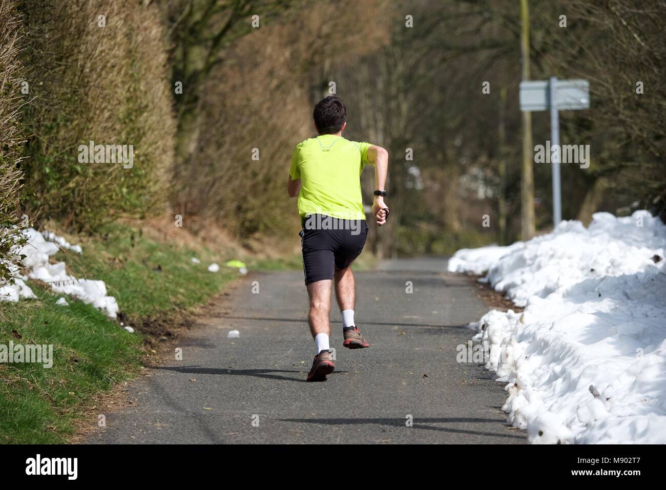 A runner does hill training. Stock Photo