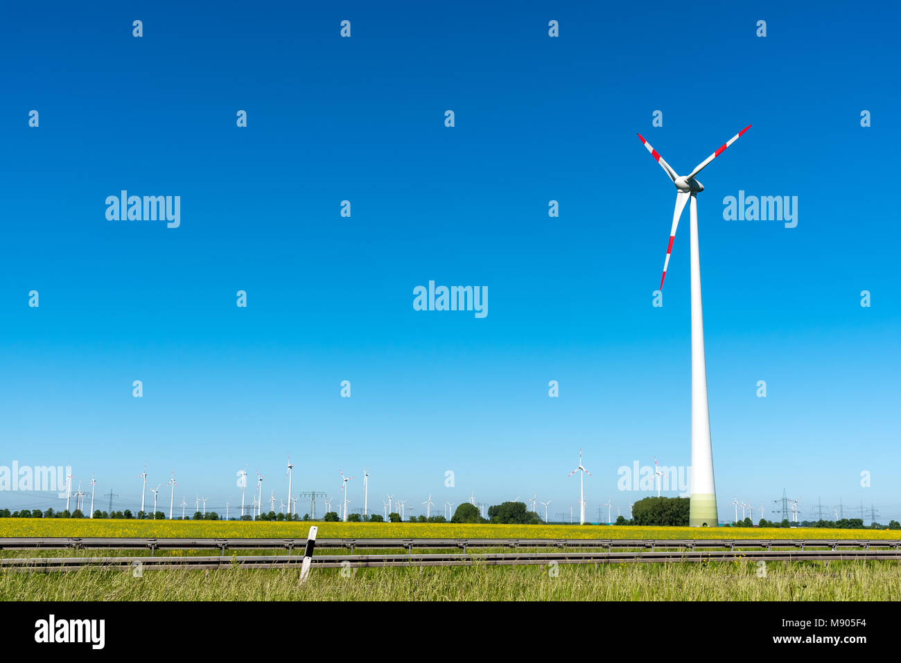 Renewable energy plants with a blue sky seen in Germany Stock Photo
