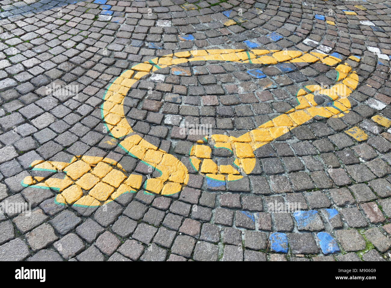 Electric car logo painted on soil in reserved parking zone near docking station Turin Italy March 14 2018 Stock Photo