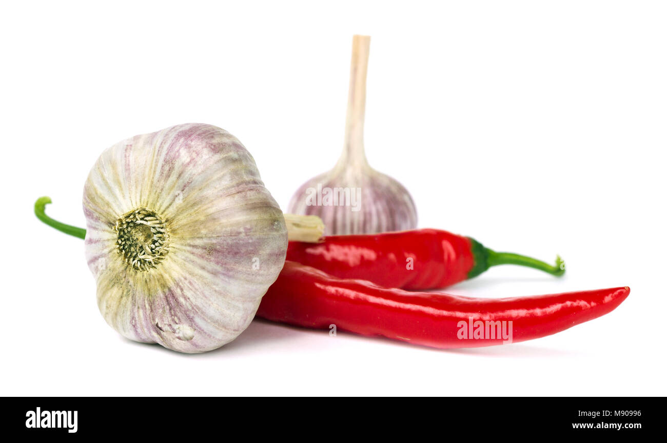 Red pepper and garlic lie on white background Stock Photo