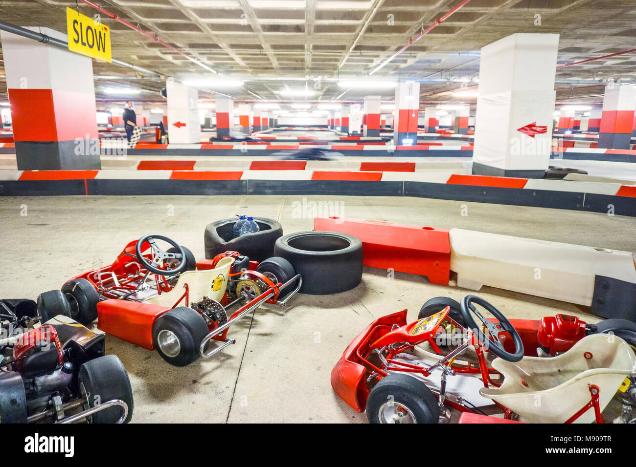 A few, red go karts on indoor karting track Stock Photo