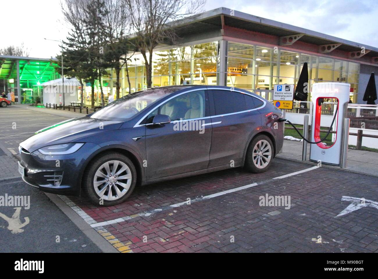Hybrid, Electric Cars at charging point Stock Photo Alamy