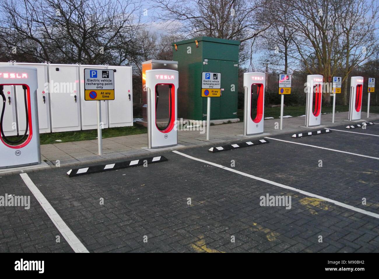 Hybrid, Electric Cars at charging point Stock Photo Alamy