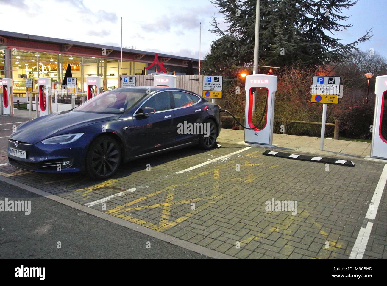 Hybrid, Electric Cars at charging point Stock Photo Alamy