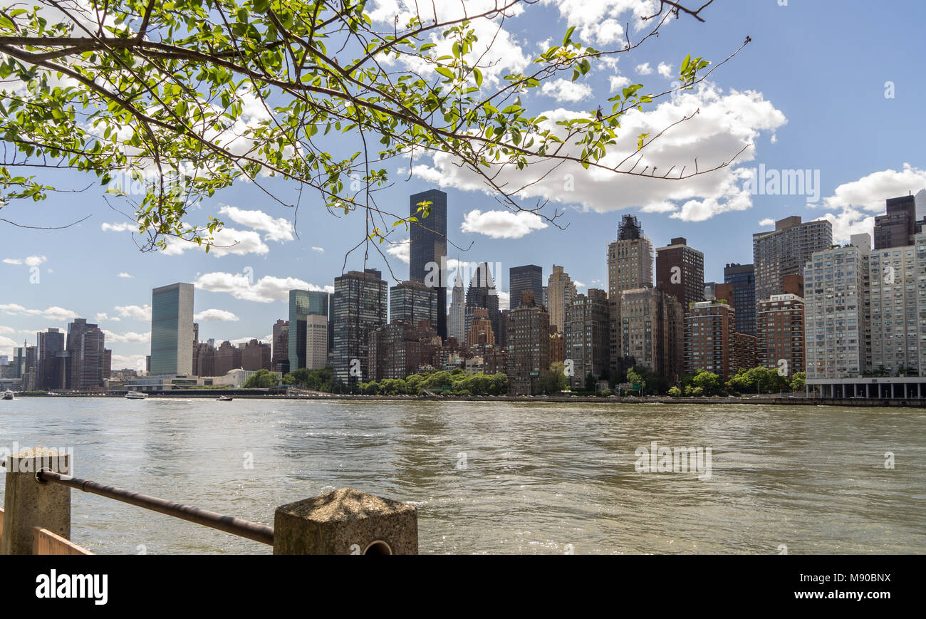 View of East Side Manhattan Skyline And East River Stock Photo
