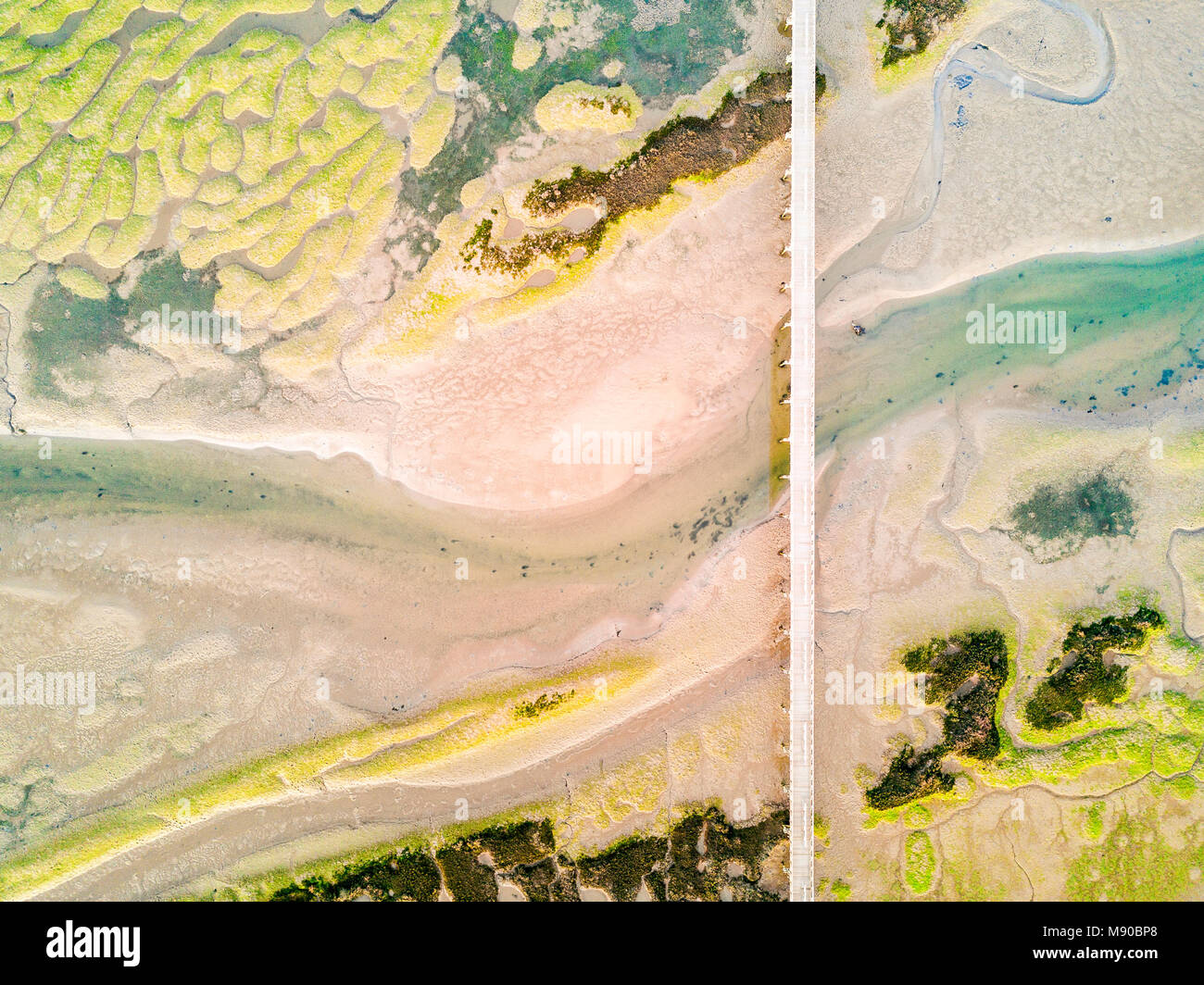 Pedestrian bridge over amazingly beautiful Ria Formosa in Quinta do