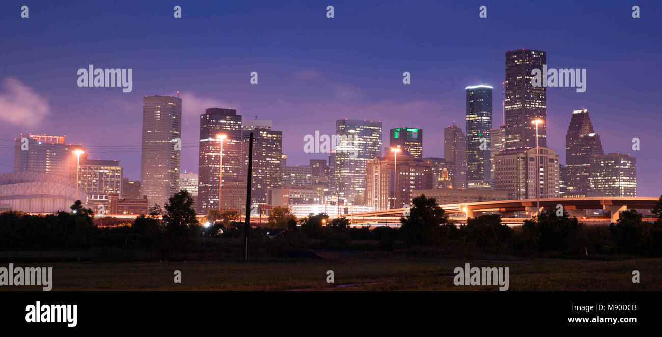 Deep blue sky after dusk as lights illuminate the buildings of the