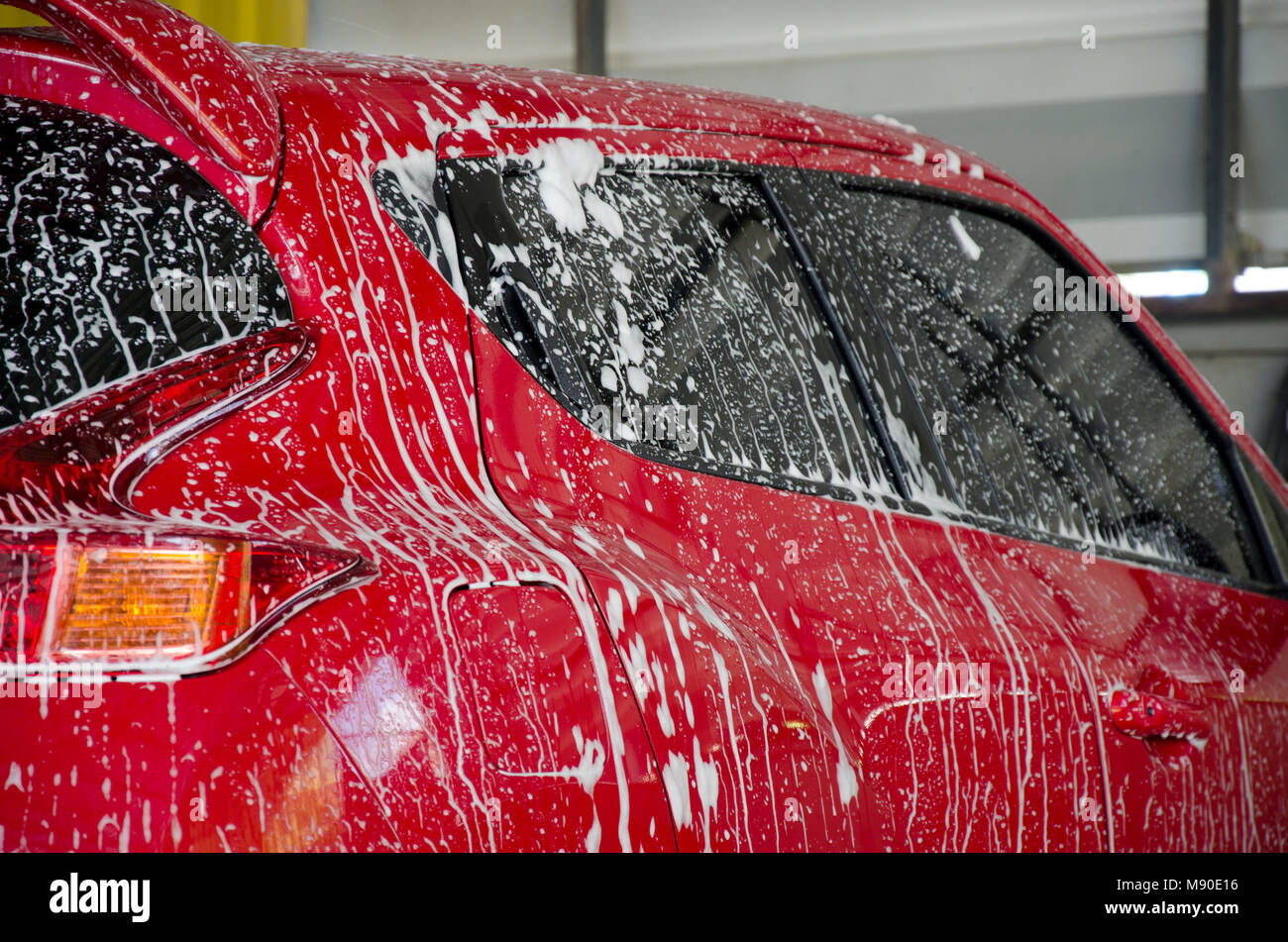 Car wash with foam in car wash Stock Photo Alamy