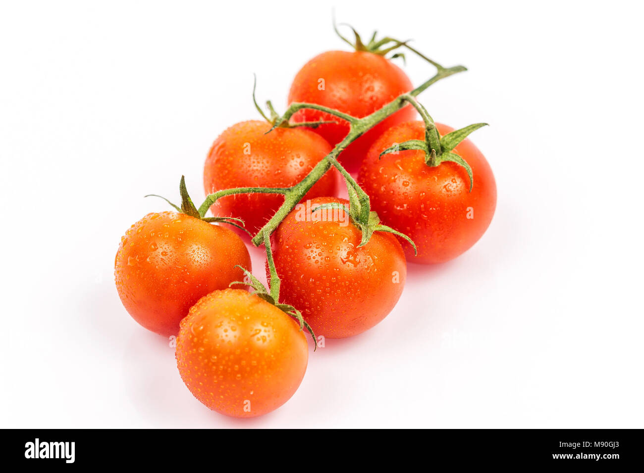 Tomato with water drops isolated on white background Stock Photo - Alamy