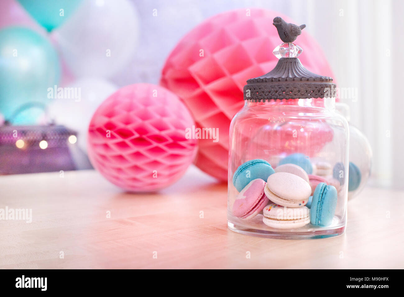Colorful macaroons and paper balls Stock Photo