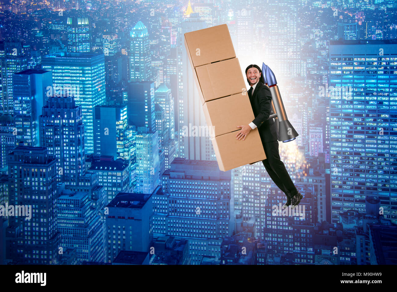 Businessman with jetpack delivering boxes globally Stock Photo - Alamy