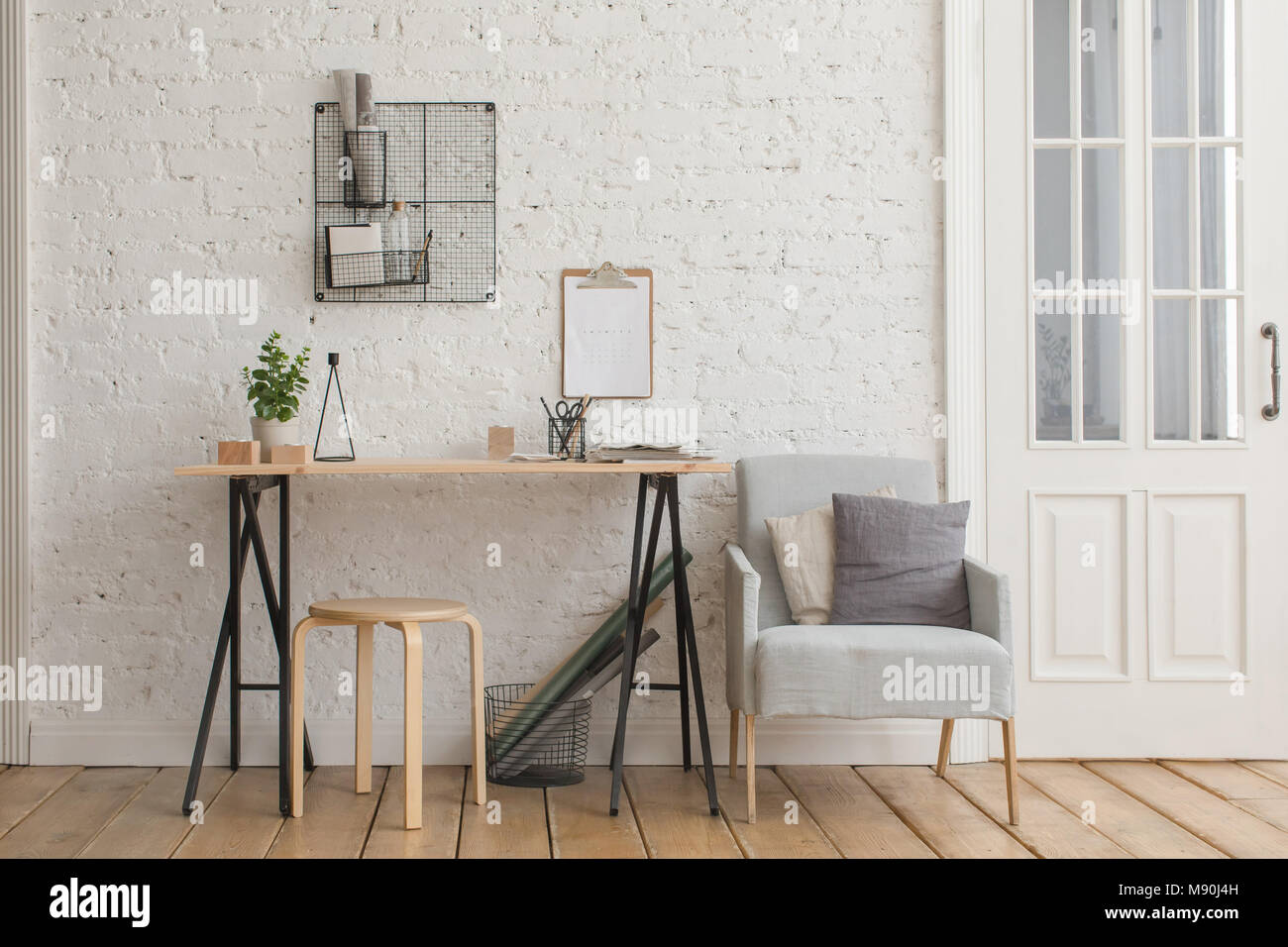Desk with stationery in the white interior Loft Stock Photo Alamy
