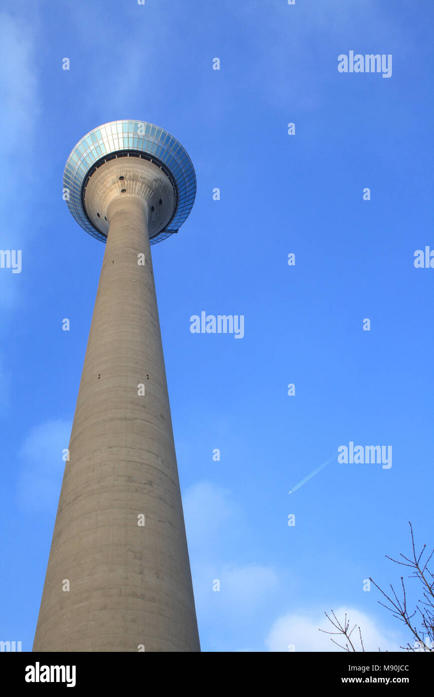 Radio tower in Dusseldord, Germany on blue sky background Stock Photo