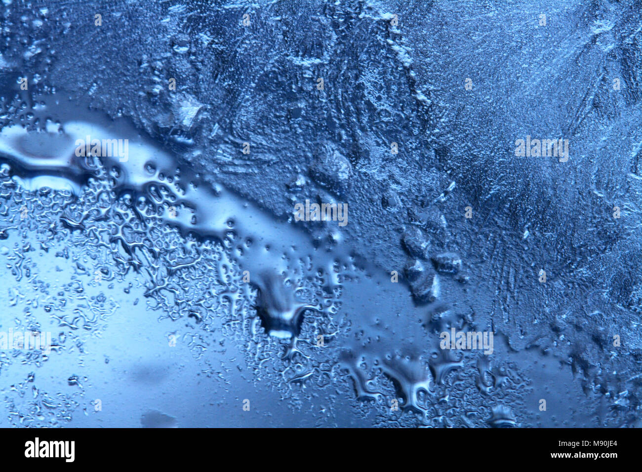 Nice abstract water and ice background on glass Stock Photo Alamy