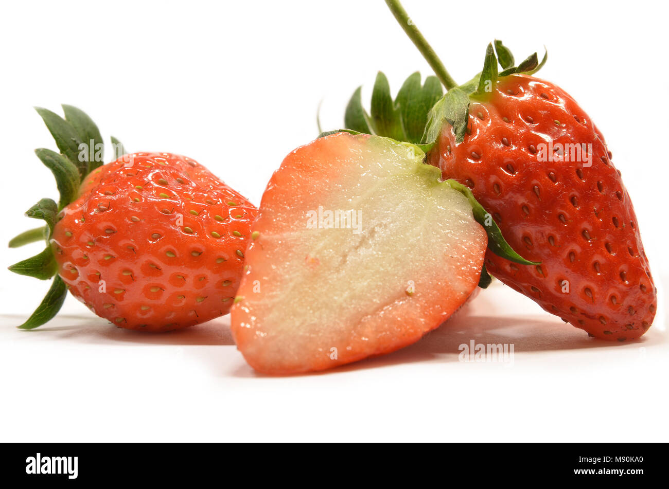 Strawberry fruits isolated on a white background Stock Photo - Alamy