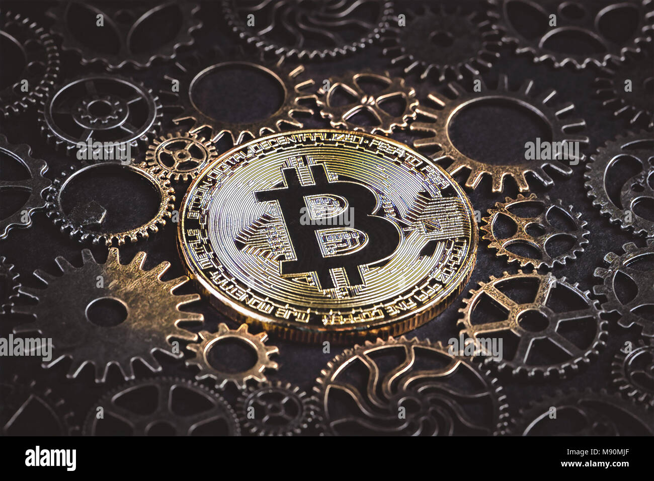 Golden bitcoin glowing in the middle of cog wheels Illustration ...
