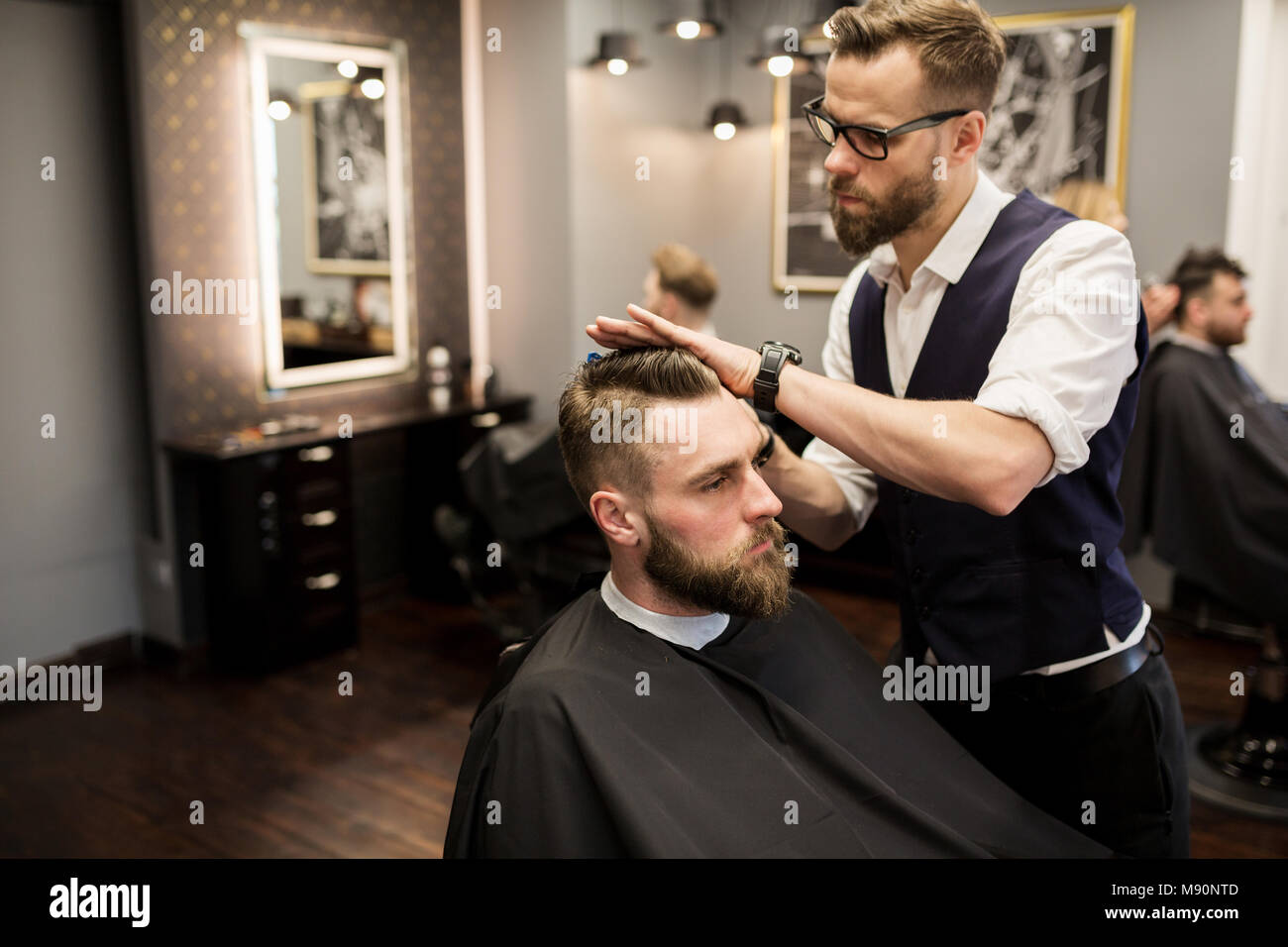 Hair stylist working on client hi-res stock photography and images - Alamy