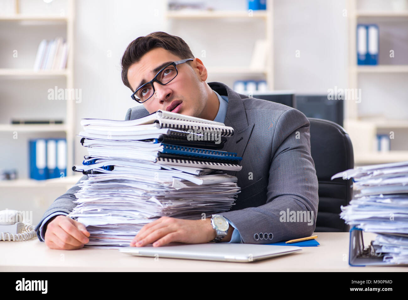 Overloaded work employee under hi-res stock photography and images - Alamy