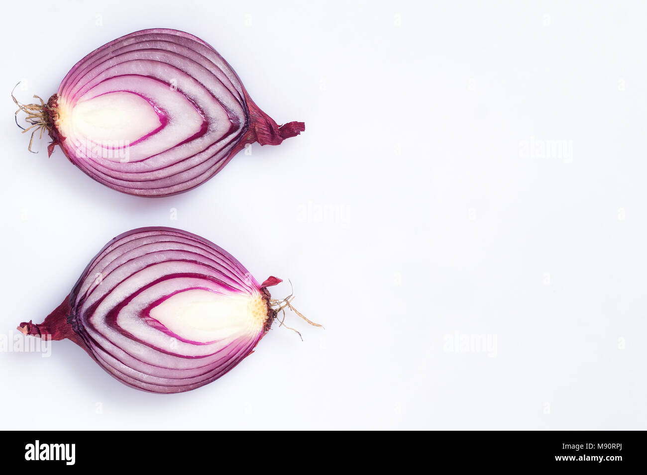 Red onion cut in half. Food background Stock Photo - Alamy