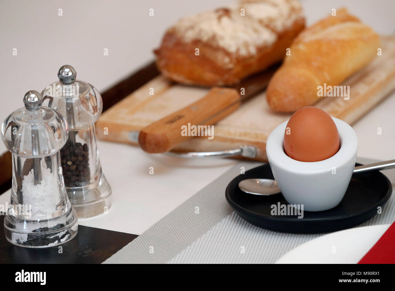 Breakfast on a table at a hotel. Egg and bred. Stock Photo