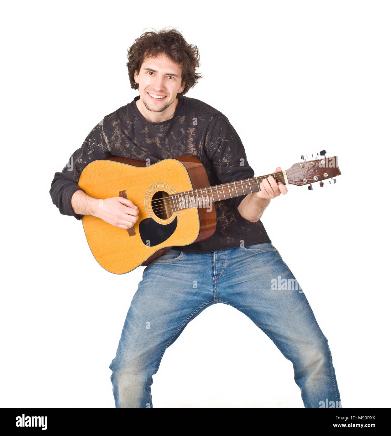 Young smiling guy playing on a gitare Stock Photo