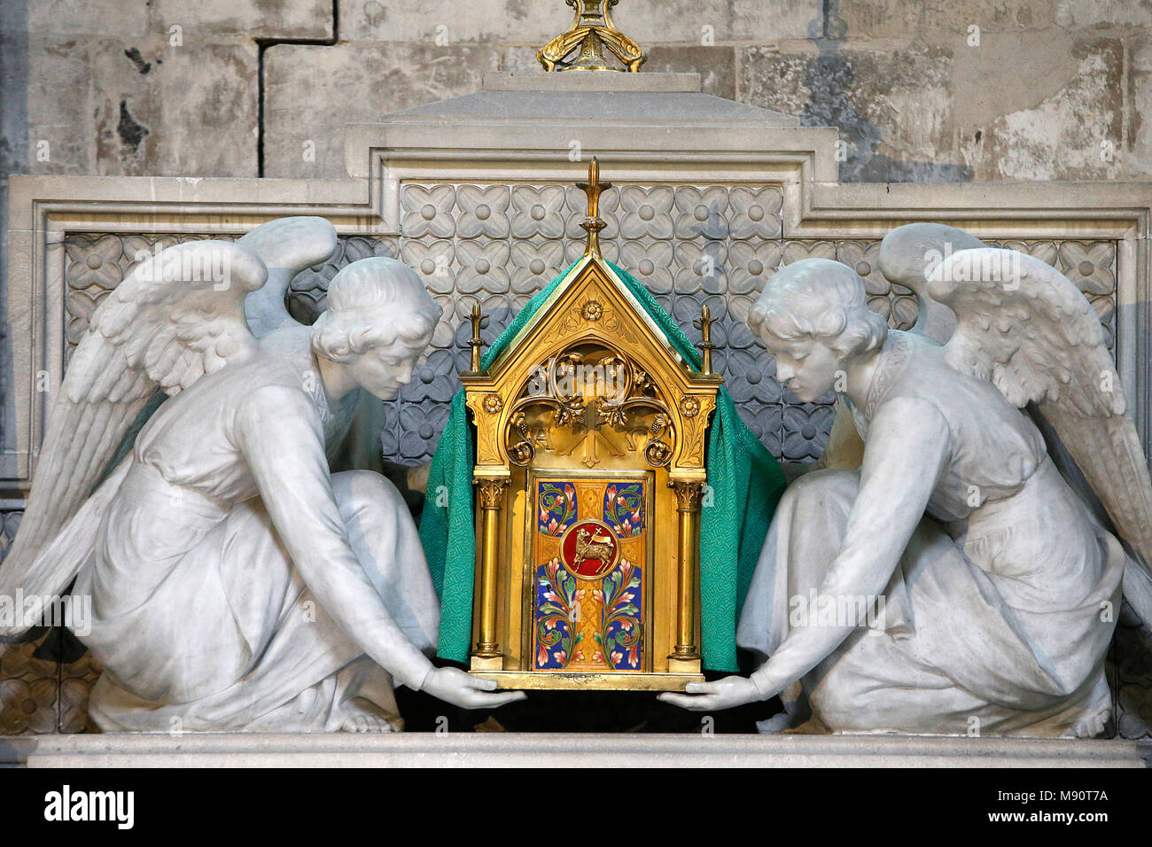 Notre-Dame cathedral, Rouen. Angels holding a reliquary. Stock Photo