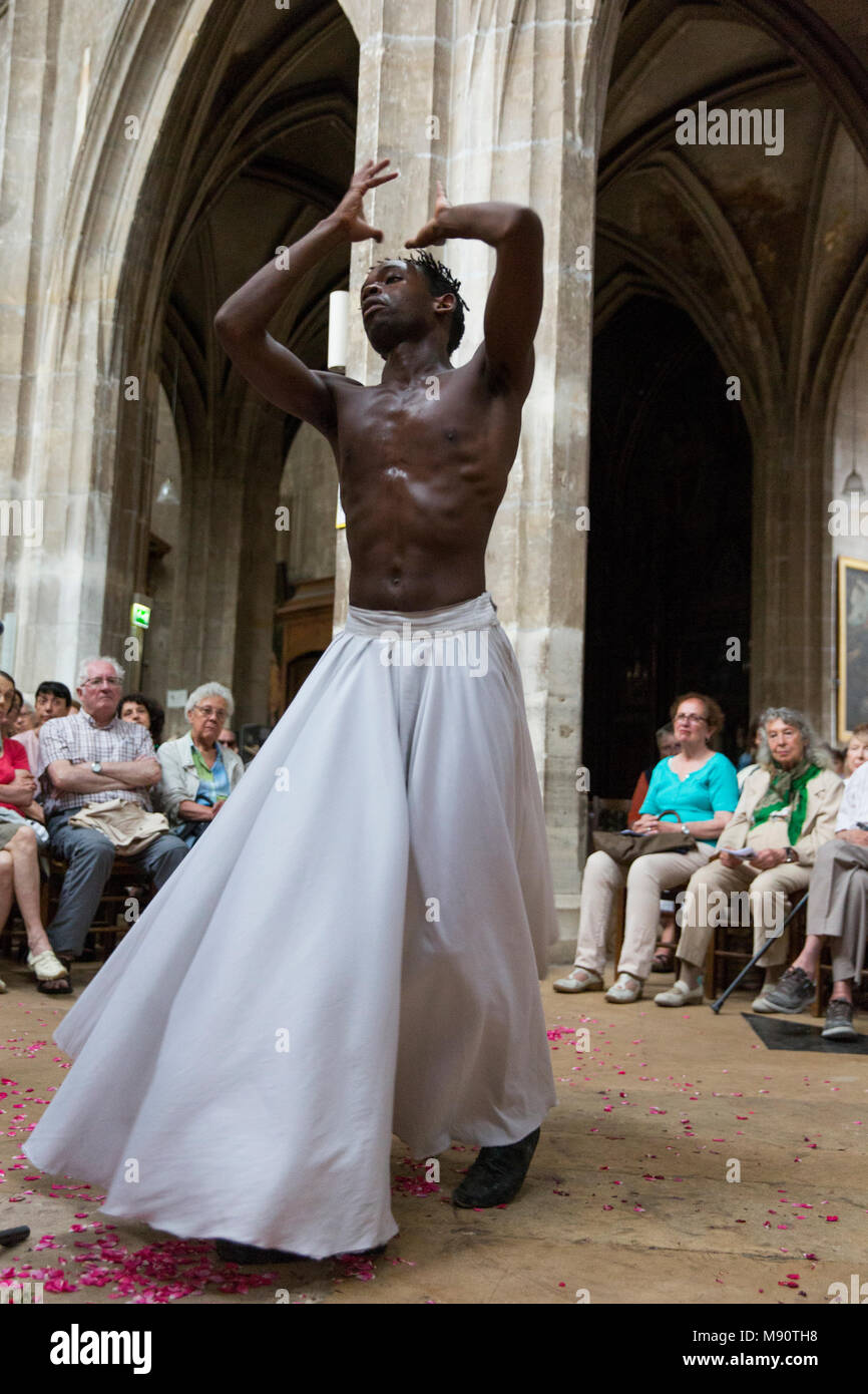 Concert and sufi poetry reading in Saint-Merry church, Paris.  Dancer SmaÃ¯l KanoutÃ©. Stock Photo