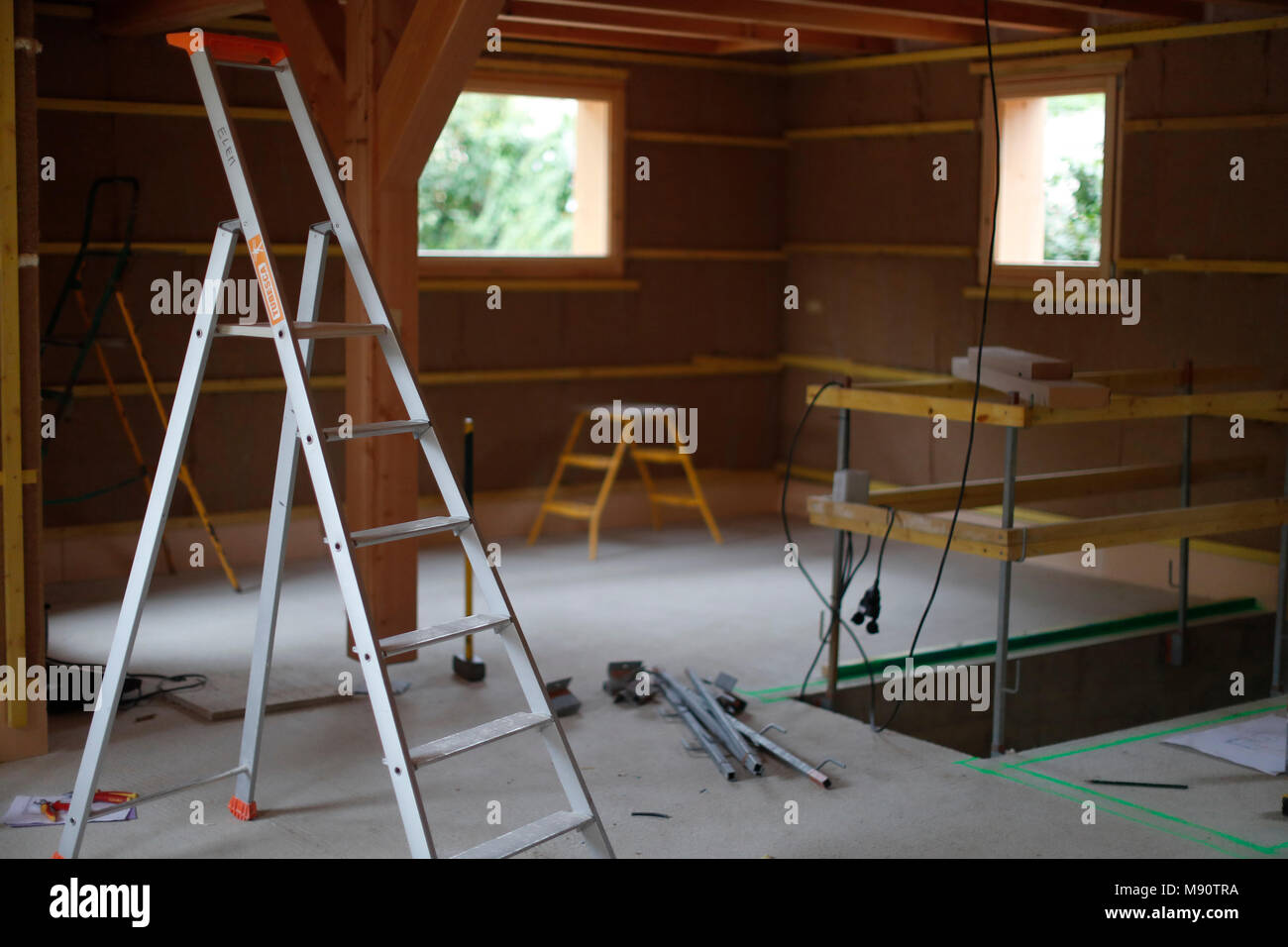 Wooden structure of house under construction. Stock Photo