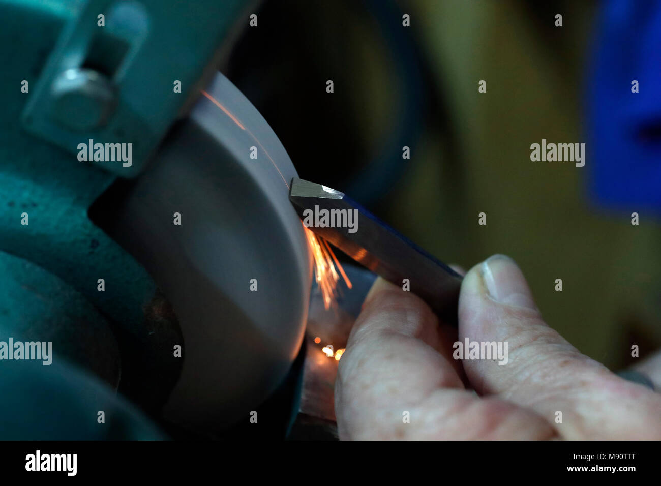 Man working on a wood lathe. Stock Photo