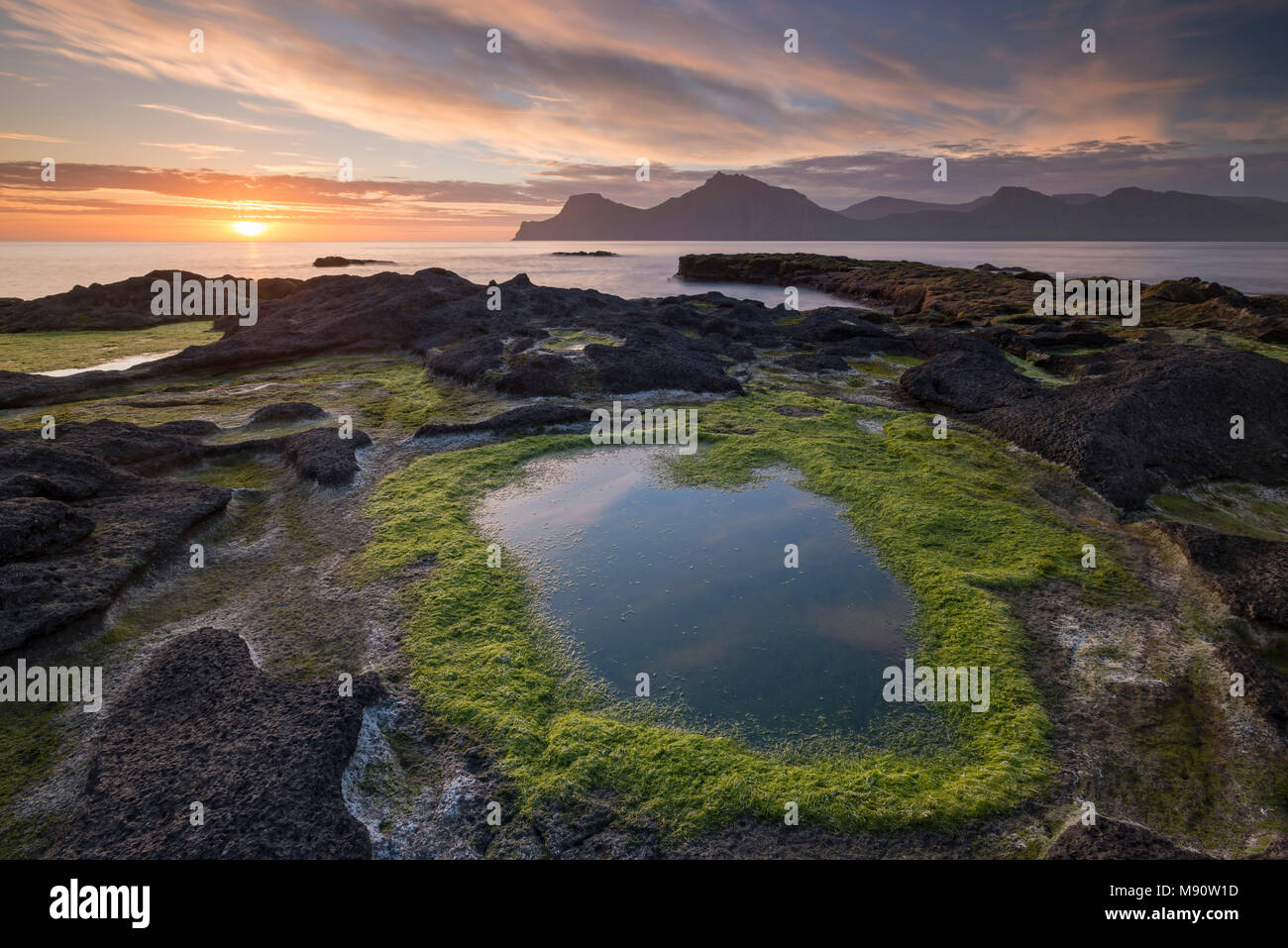 Sunrise at Gjógv on the longest day of the year, Eysturoy, Faroe Islands, Denmark. Summer (June) 2017. Stock Photo