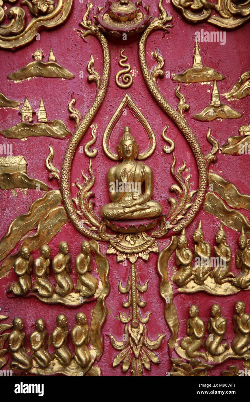 Art work in Wat Chai Mongkhon, Chiang Mai. The Buddha and his sangha. Thailand Stock Photo