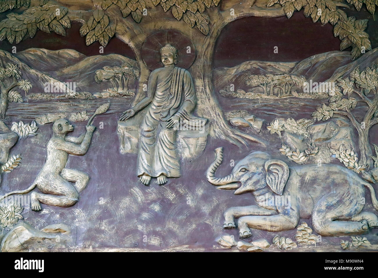 Minh Dang Quang buddhist temple. Life of the Buddha. Siddhartha Gautama with the devoted elephant.  Ho Chi Minh city. Vietnam. Stock Photo