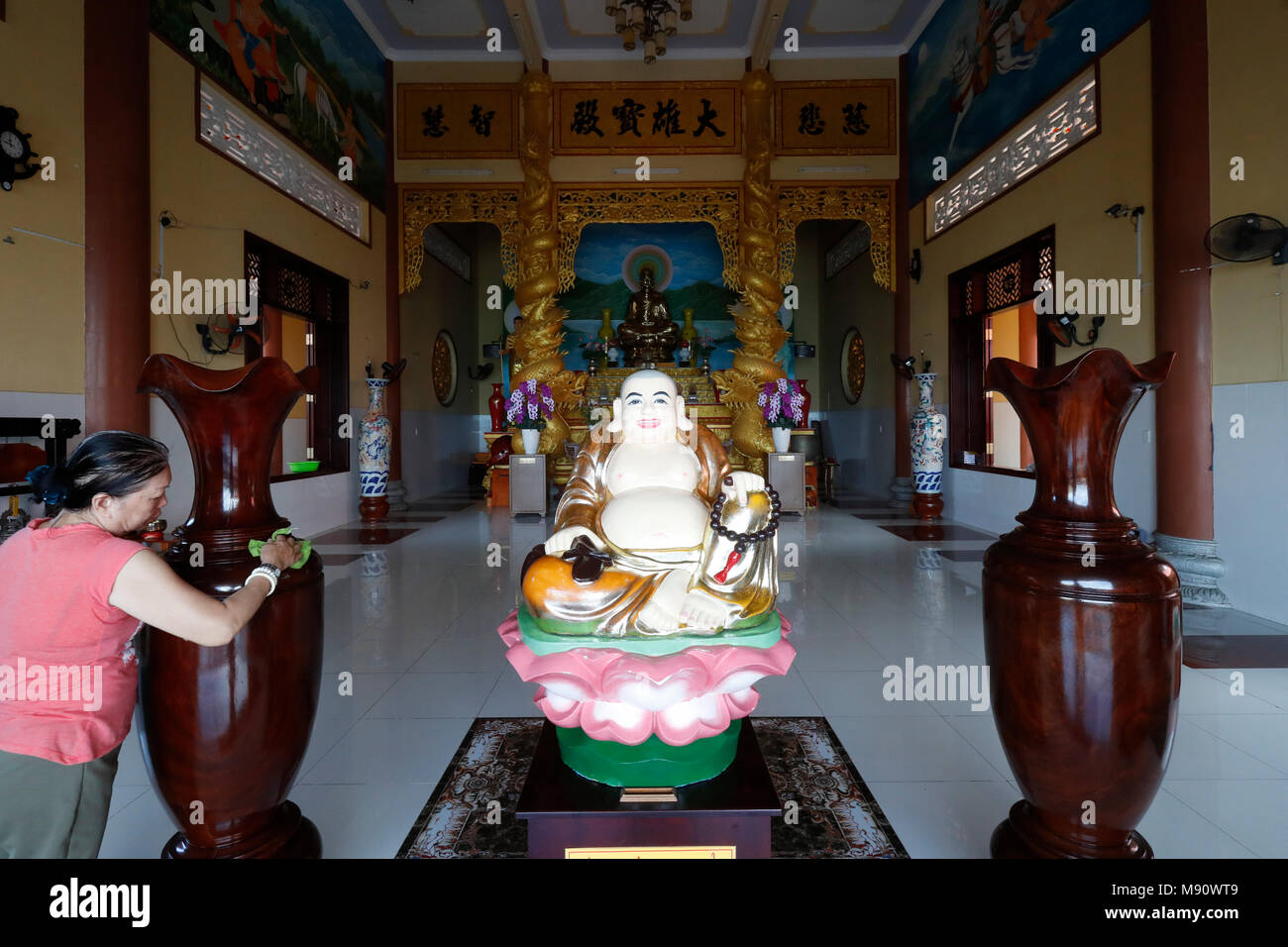 Chua Tu Quang buddhist temple. Happy Buddha statue for good luck and