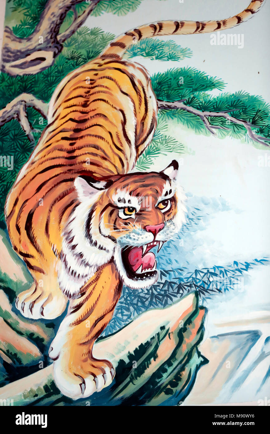 Hoi Tuong Te Nguoi Hoa buddist chinese temple. Tiger painting.  Phu Quoc. Vietnam. Stock Photo