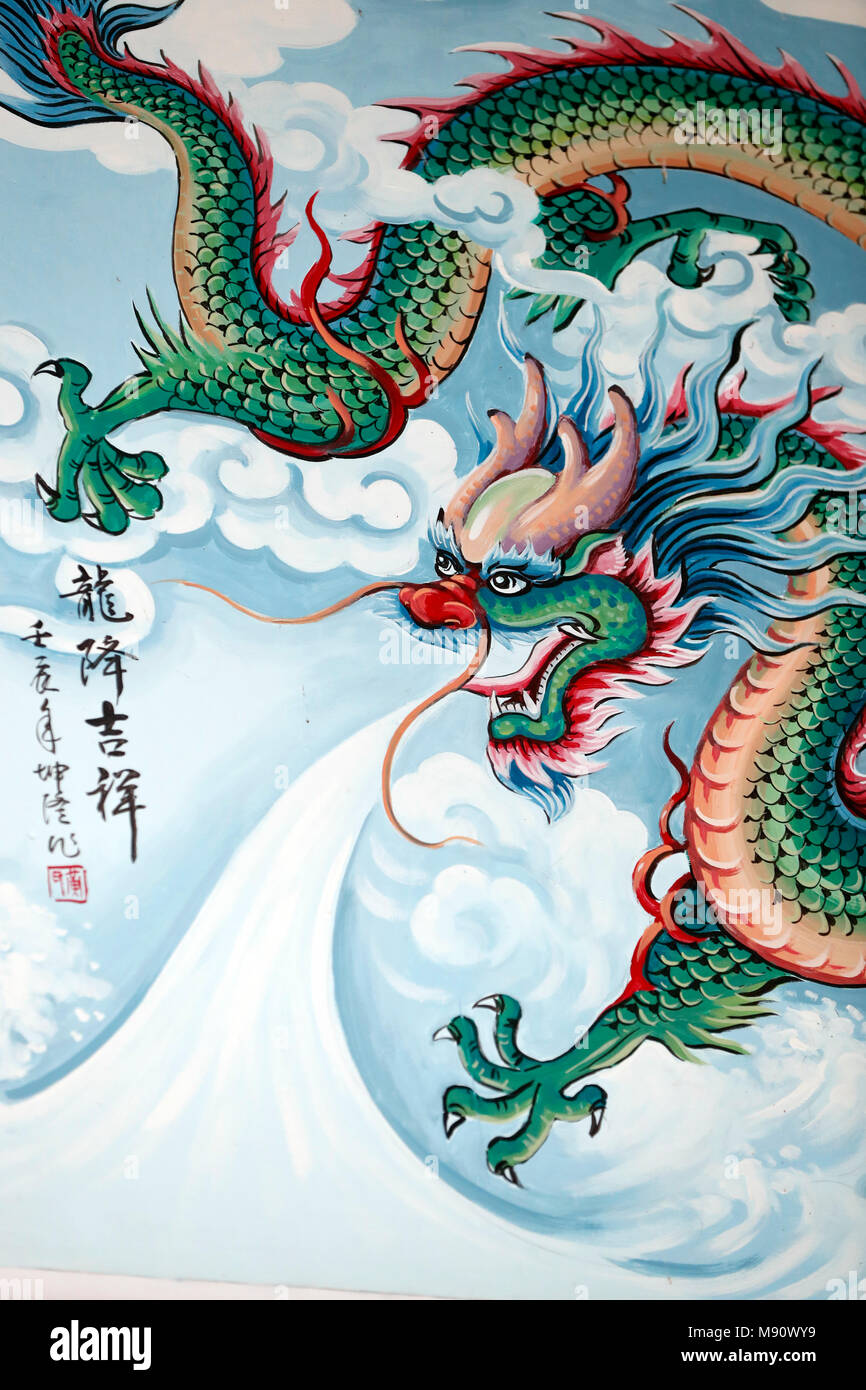 Hoi Tuong Te Nguoi Hoa buddist chinese temple. Chinese dragon painting.  Phu Quoc. Vietnam. Stock Photo