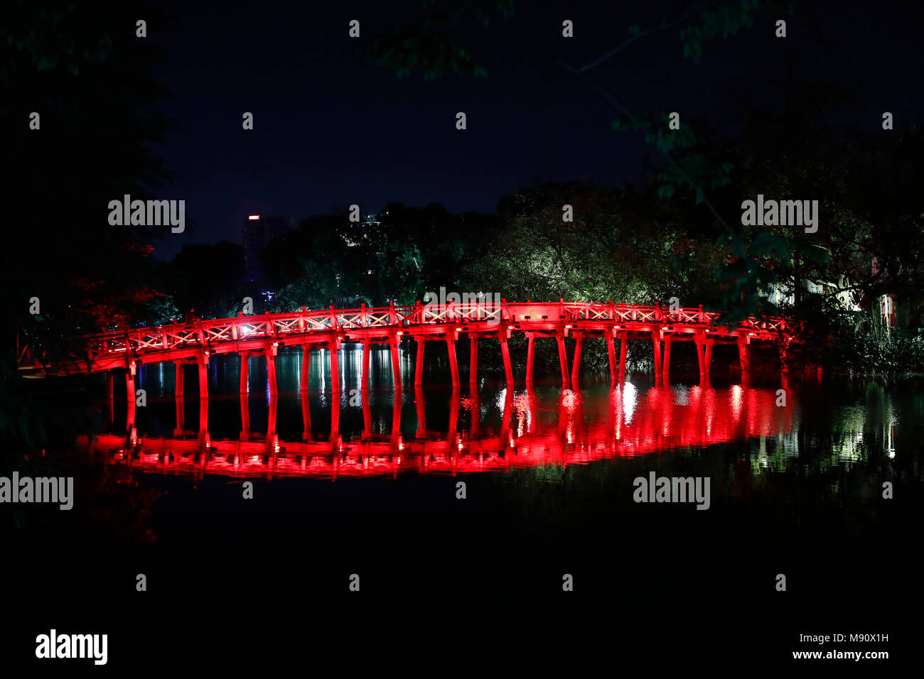 Huc Bridge on Hoan Kiem Lake at night. Hanoi. Vietnam. Stock Photo