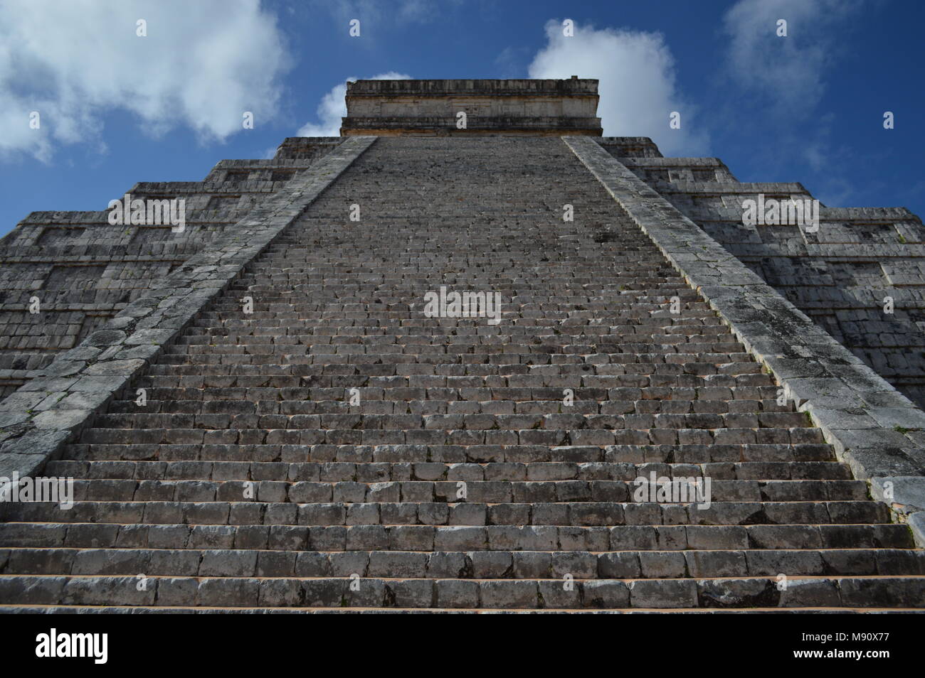 Looking up the steps of the north side of El Castillo at Chichen Itza, Mexico Stock Photo