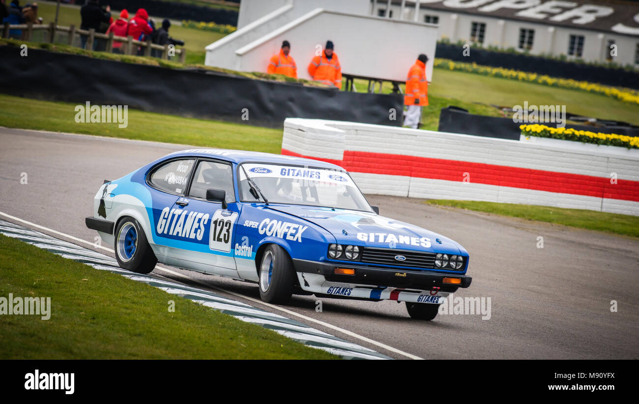 Ric Wood driving the 1978 Gitanes liveried Ford Capri in the Gerry Marshall Trophy during Goodwood Members Meeting 76 at Goodwood Motor Circuit Stock Photo