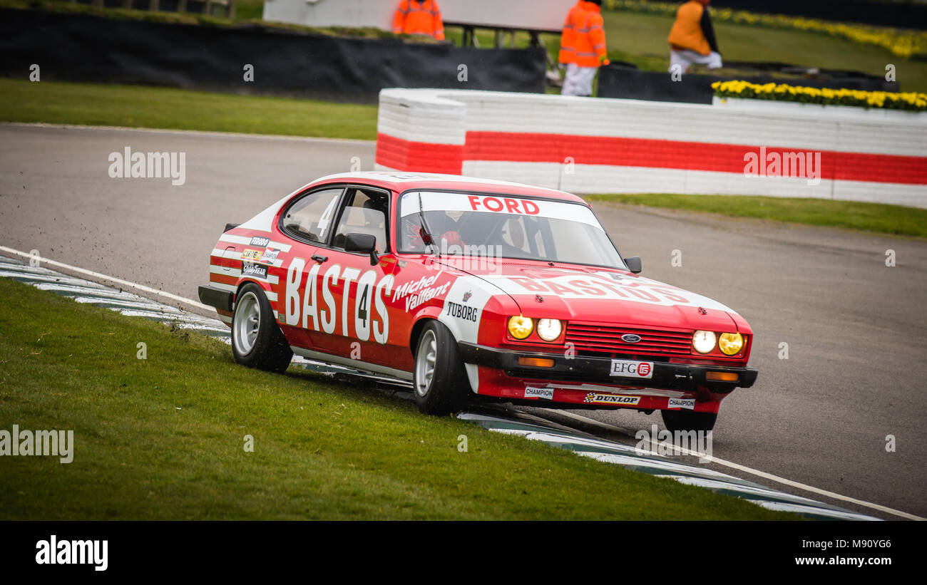 Richard Meins driving the 1979 Bastos liveried Ford Capri in the Gerry Marshall Trophy during Goodwood Members Meeting 76 at Goodwood Motor Circuit Stock Photo