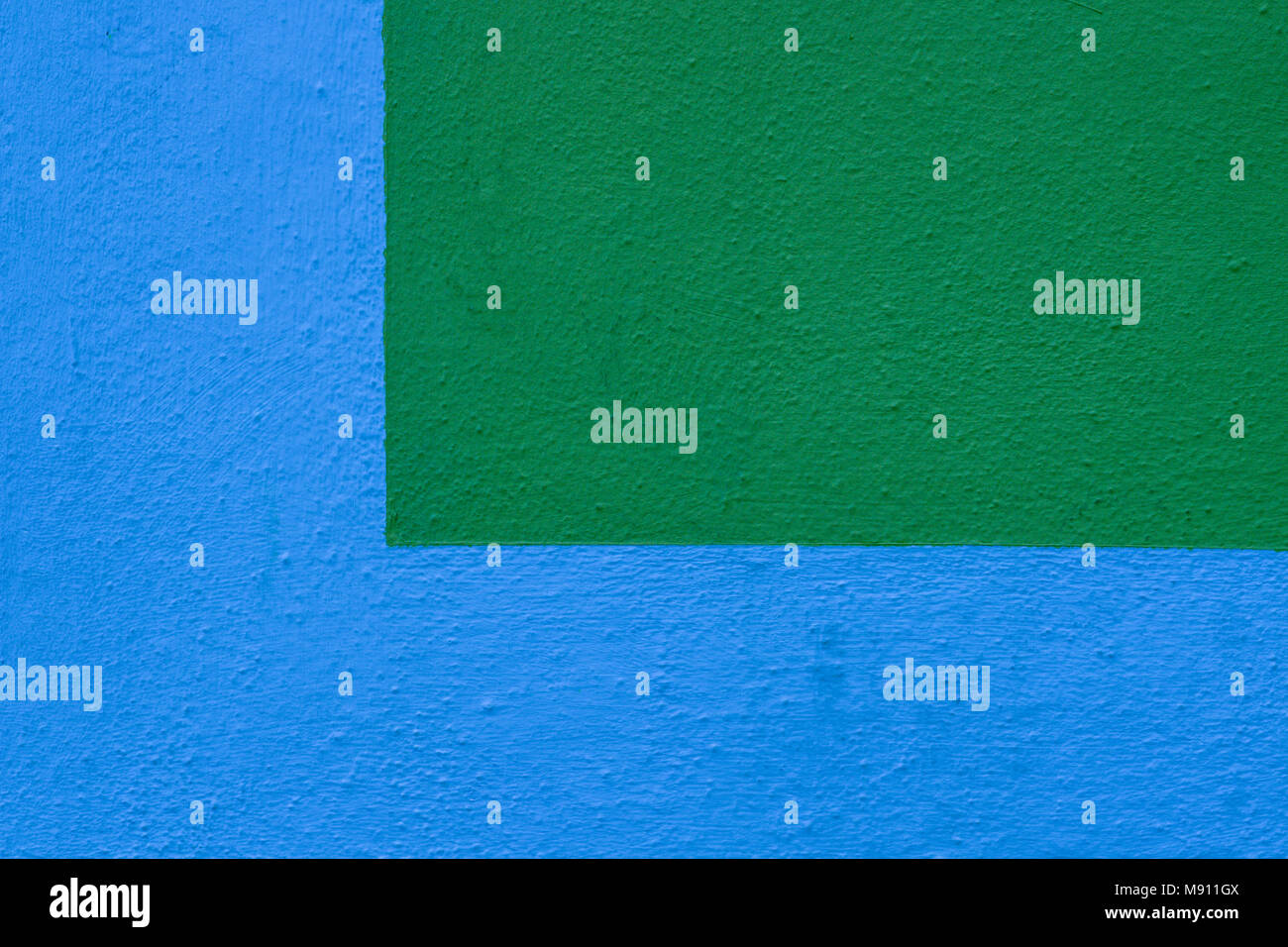 Blue and green painted plaster wall texture background Stock Photo