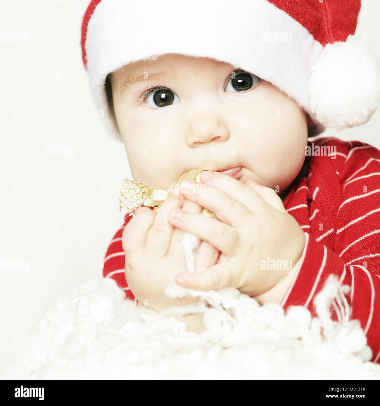 Baby, cute happy child in red, face closeup Stock Photo Alamy