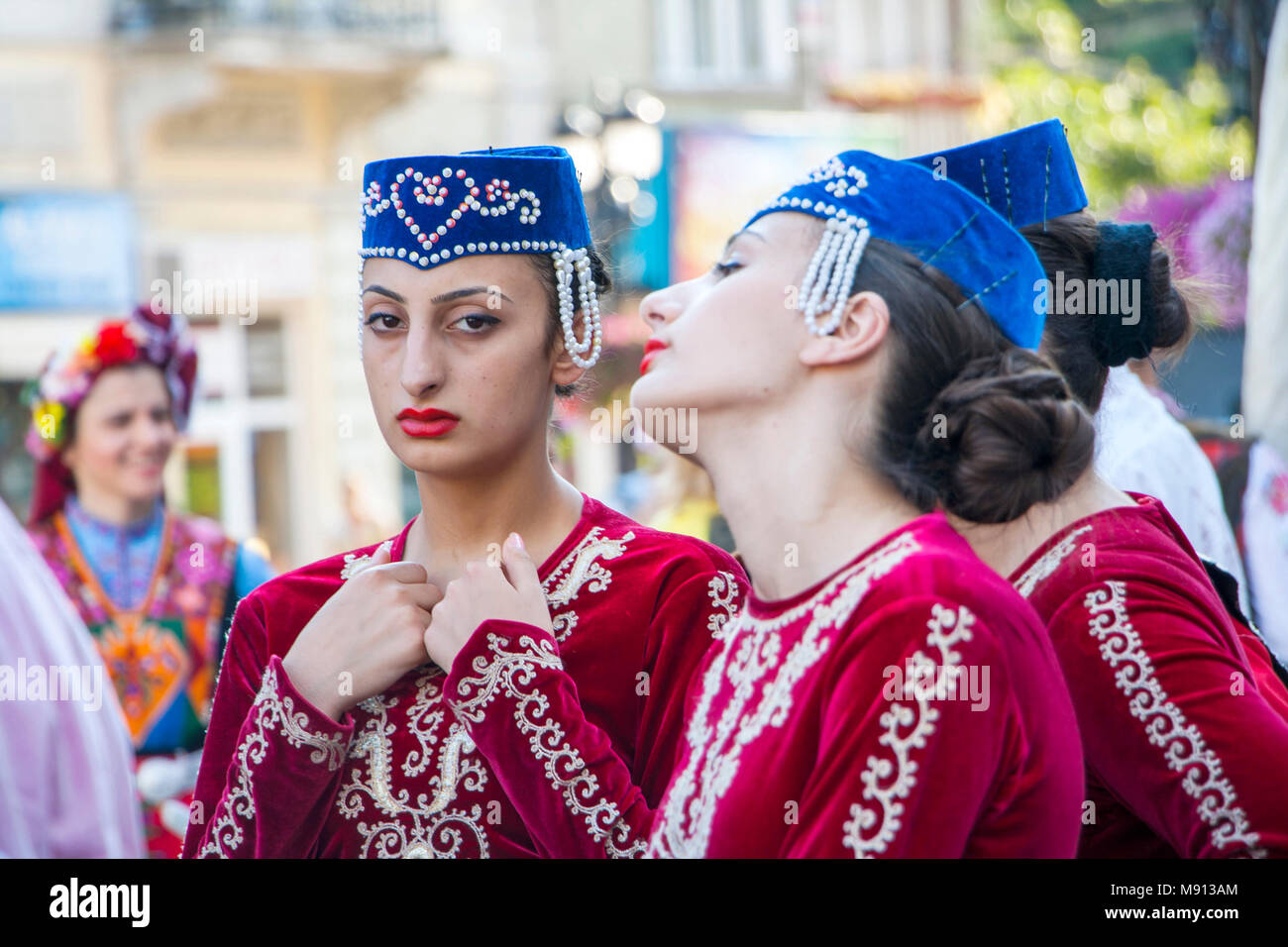 Plovdiv, Bulgaria - 3rd August 2013: Two Armenian girls in folklore costumes waiting for their performance at the XIX International Folklore Festival Stock Photo