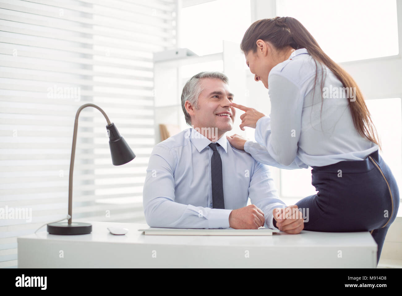 Flirting office hi-res stock photography and images - Alamy