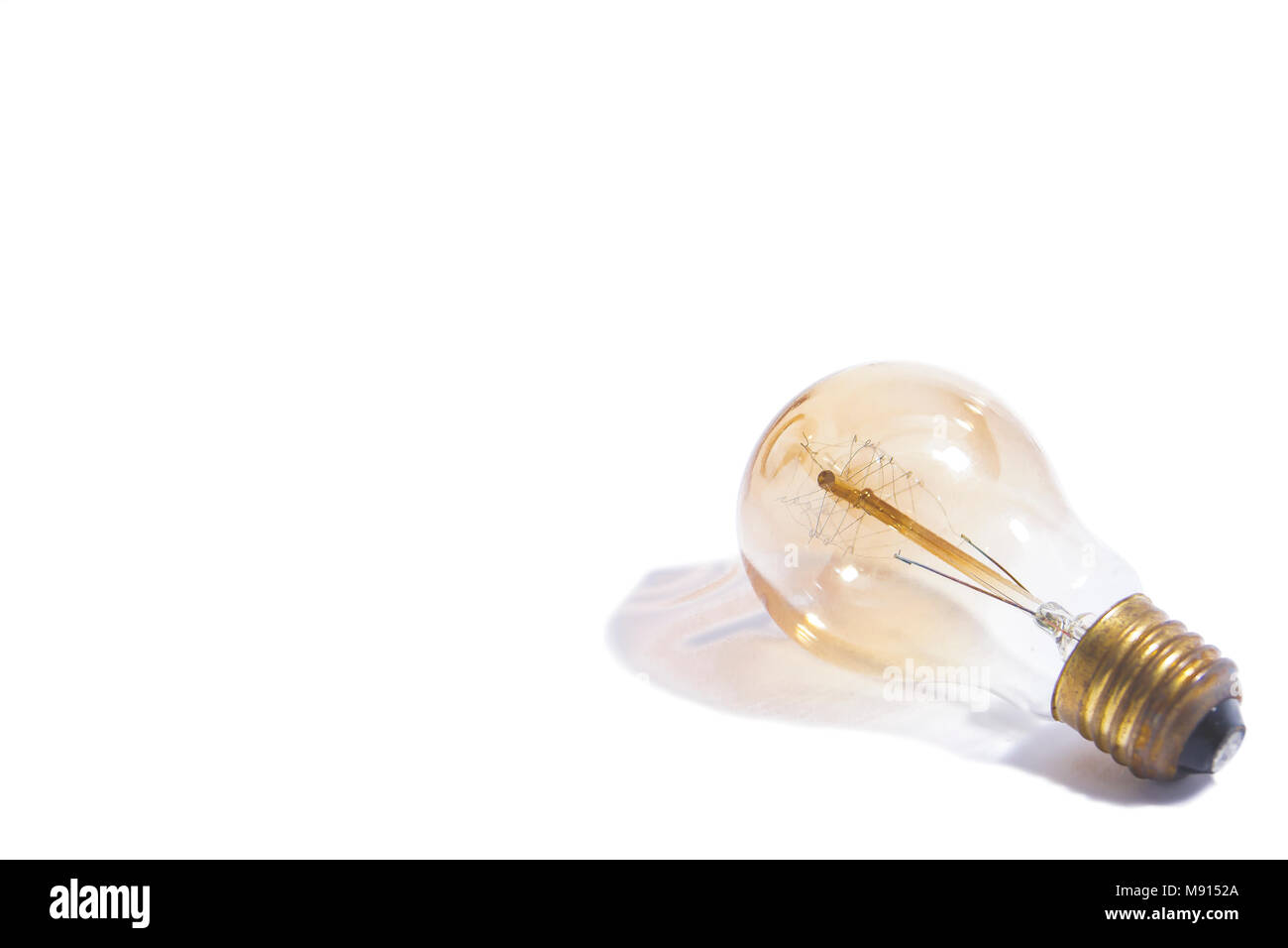 Blurred of vintage light blub on the white background. Stock Photo